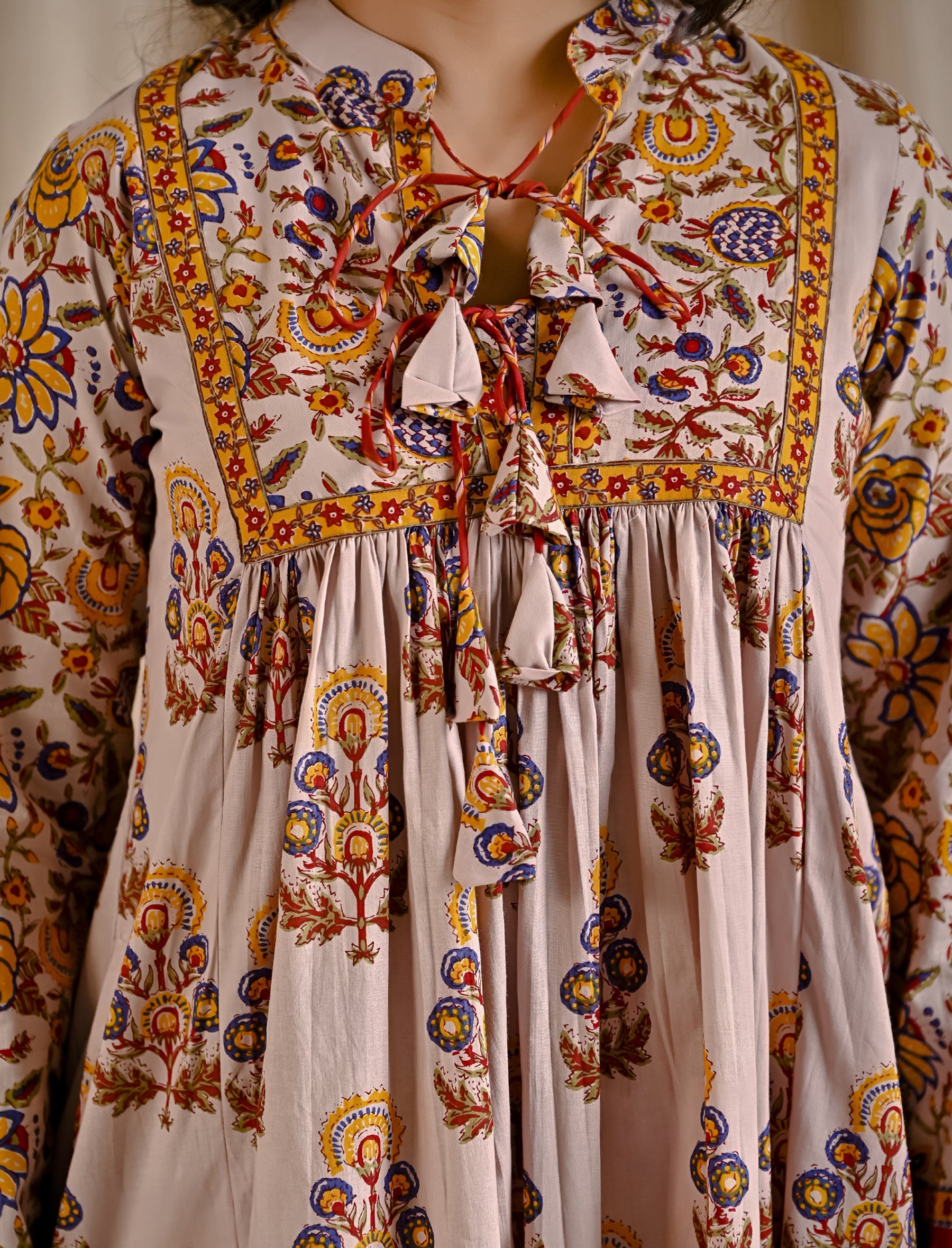 Beige Yellow Cotton Printed Flared Dress With Front Tassels